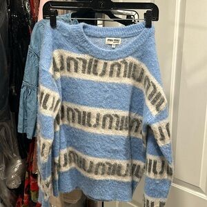 Blue sweater “Miu miu”